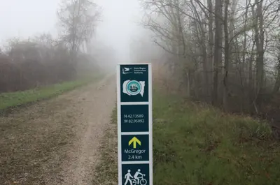The Chrysler Greenway and trail marker in the fog.