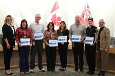 CAO Sandra Zwiers and Warden Hilda MacDonald with those recognized for empowerment at the 2024 Employee Excellence Awards.